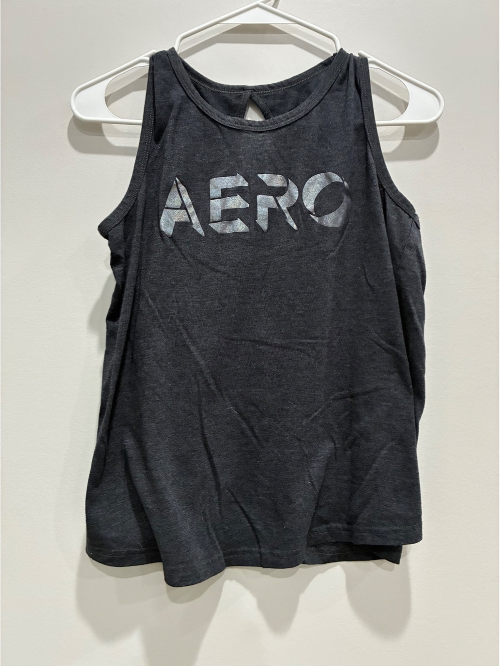 Aero Sleeveless Black Tank Top with Keyhole Back